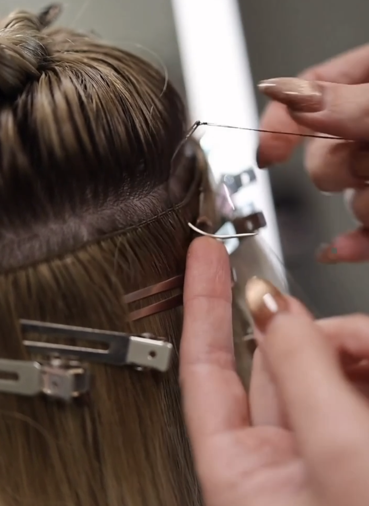 Best salon for extensions in Madison Mississippi offering both K Tip and Hand Tied extensions at Kinetic Hair Studio by Jacqueline Redd Roberson